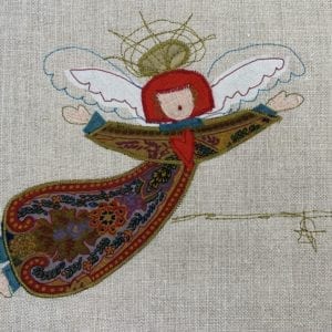 Angel: paisley robe on natural linen