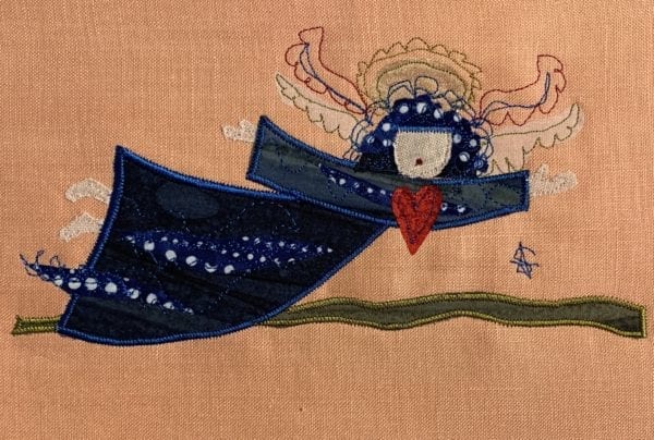 Angel: deep blue robe on peach linen