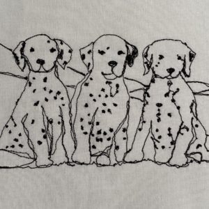 Three Dalmation Puppies