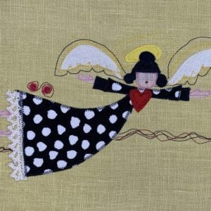 Angel: black & white dot robe on butter yellow linen